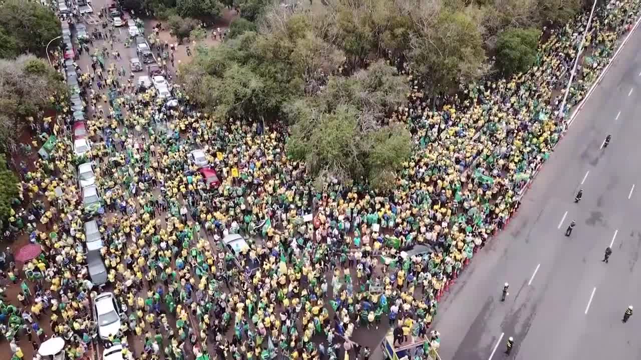 Hundreds of pro-Bolsonaro protesters call for military intervention in Brazil's capital | AFP