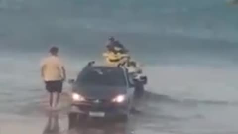 Launching a Jet Ski from a beach