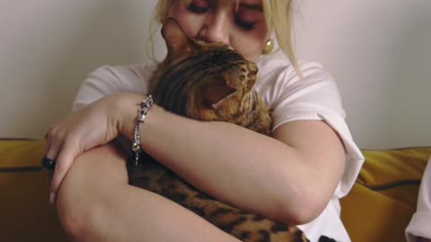 Woman Hugging Her Cat