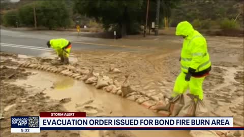 Rains force evacuation orders in Bond Fire burn area