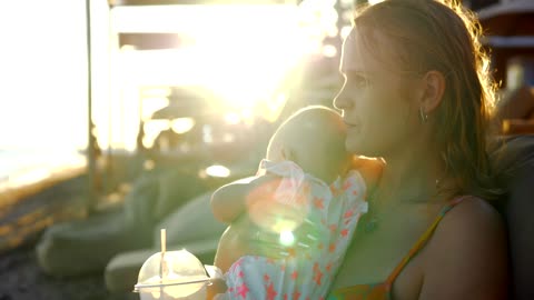 Mother enjoying a break with her baby