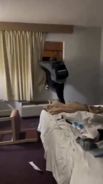 Hotel Room Intruder Smashes Window To Escape