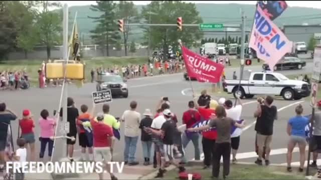 Biden's motorcade passes the crowd