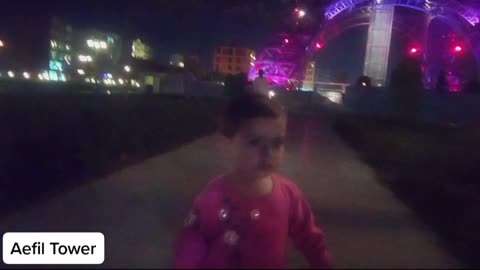 Baby Girl Enjoying At Eiffel Tower Ground