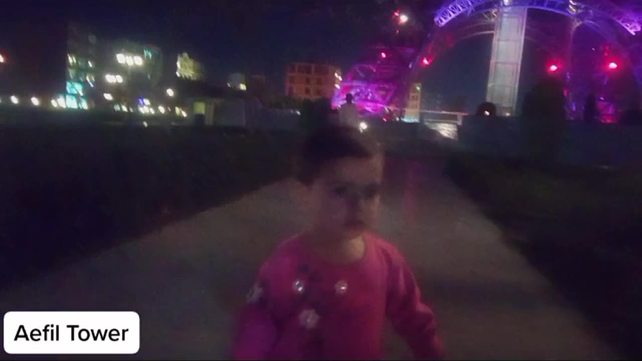 Baby Girl Enjoying At Eiffel Tower Ground