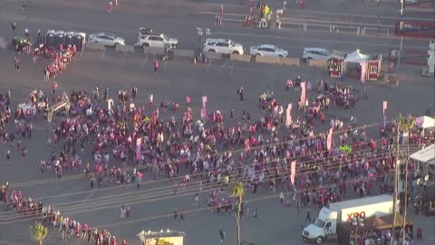 Chopper 8 flies over start of Susan G. Komen 3-Day walk