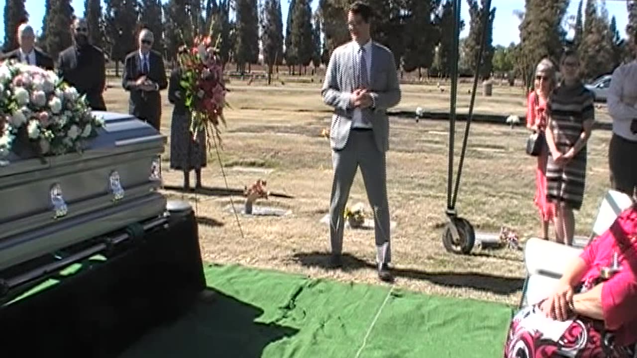 MOV059-Palbearers-casket-at-cemetery