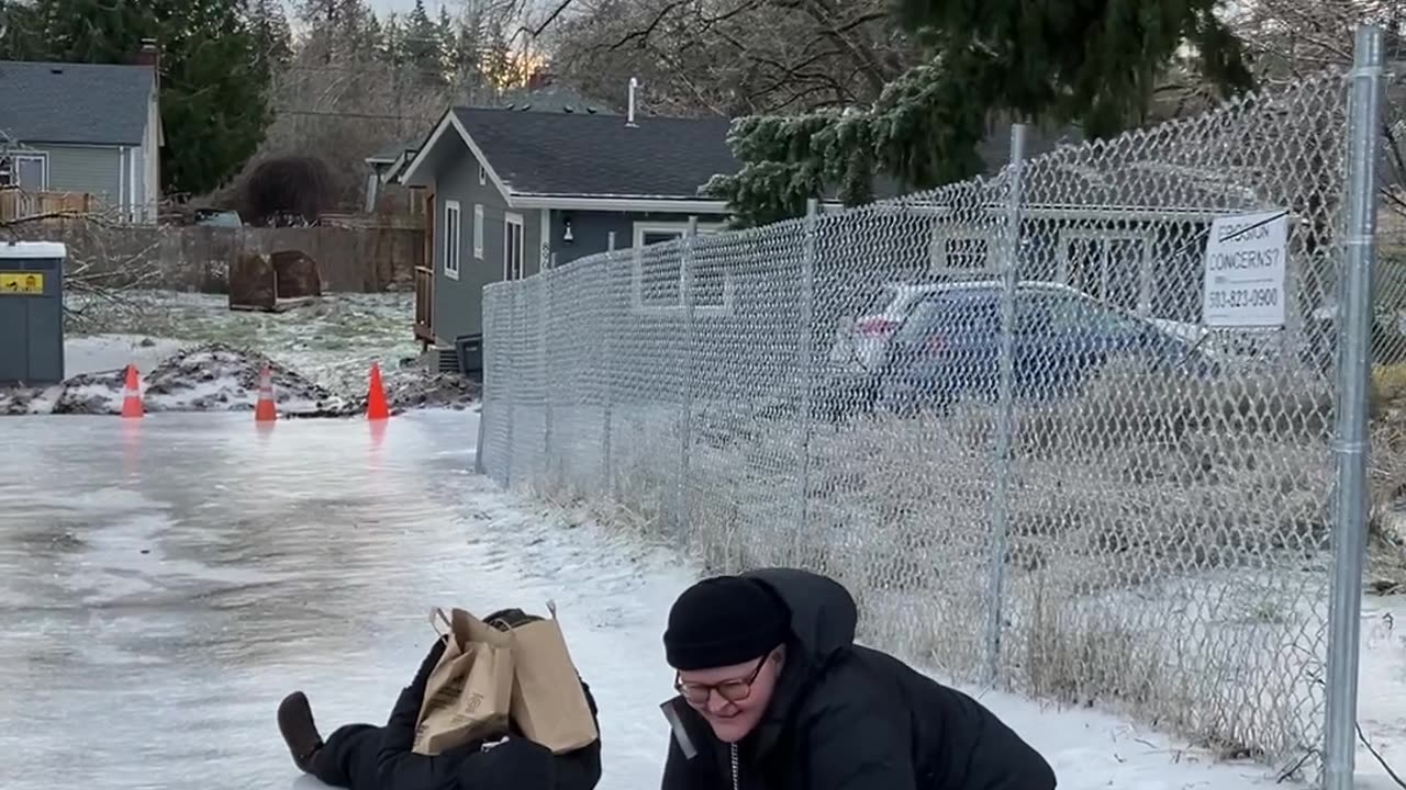 Portlanders Slide Down Icy Drive Way to Protect Their Groceries