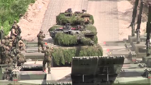 Germany to send battle tanks to Ukraine: sources
