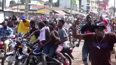 Residents in Guinea's capital celebrate military takeover