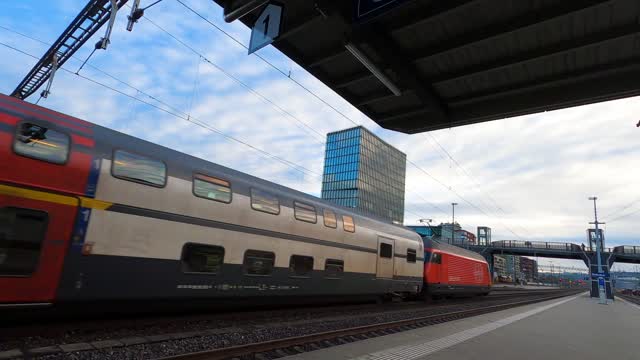 An Electric Train Passing by the Station