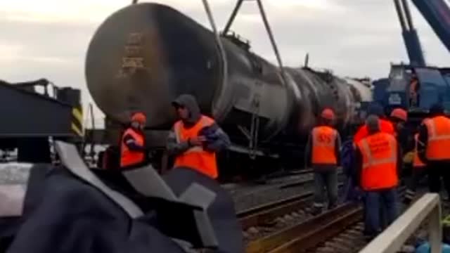 Railway workers have begun to dismantle the fuel tanks damaged by the explosion