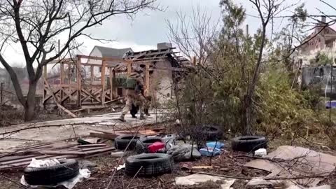 Ukraine soldier rescues dog on frontline near Kyiv