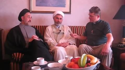 Mr Khatami (the former President of Iran) talks to Father Dave