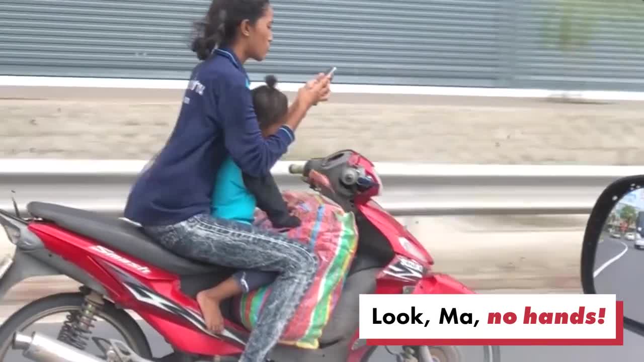 Woman Boldly Texts And Drives With A Kid On Her Bike!