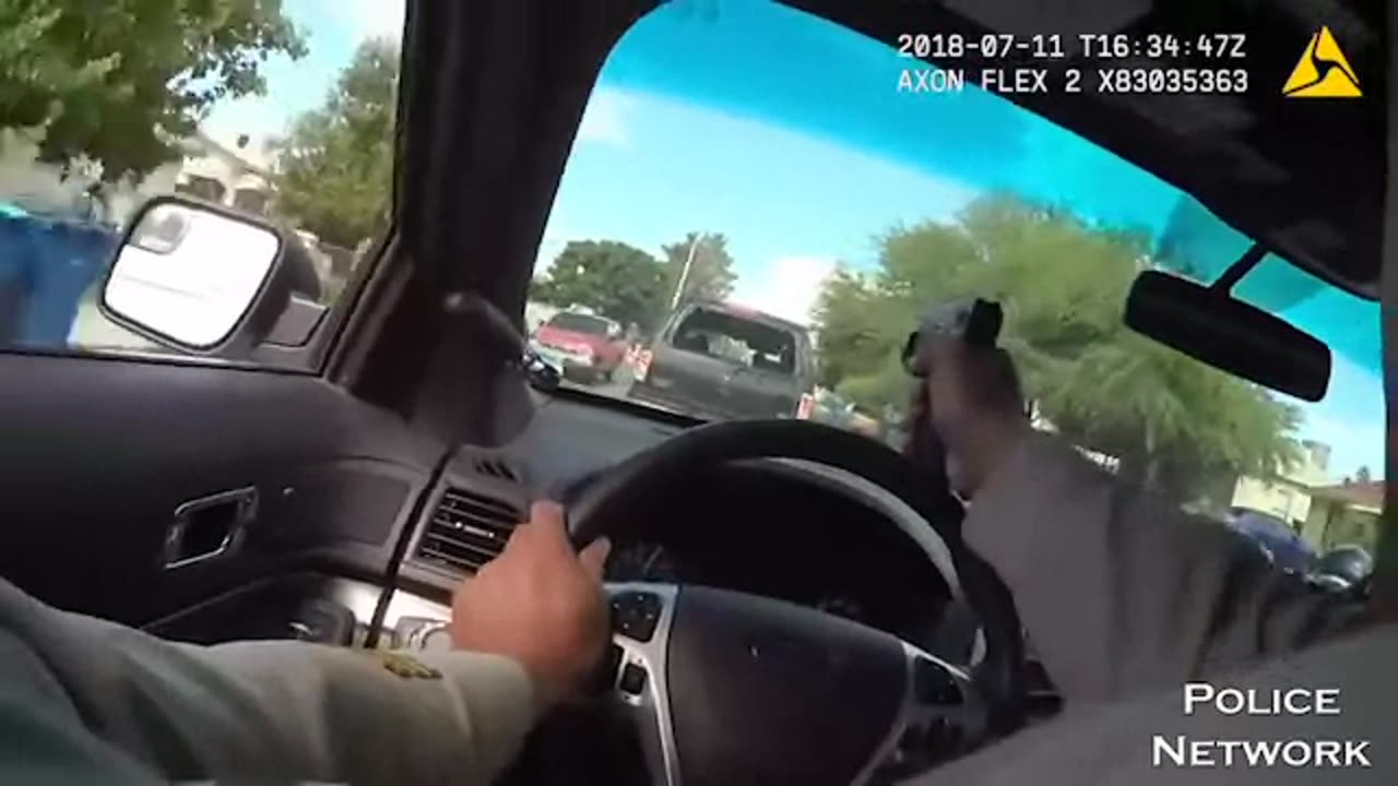 Cop emptys clip in speed chase