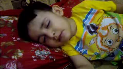 Funny Kid eats while sleeping