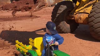 Boy Gets Toy Tractor Loaded by Real Excavator