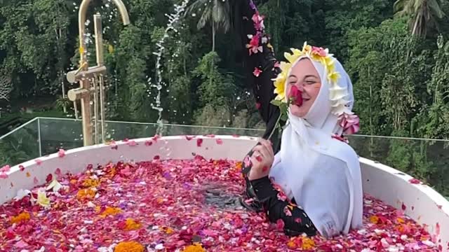 in clothes in the pool. Why???