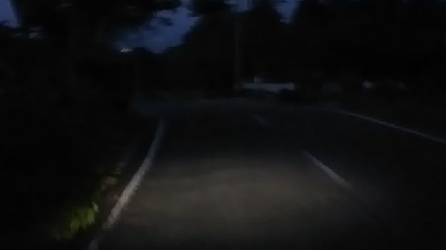 view of the road in the hills at night