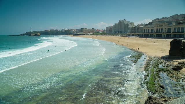 Ocean waves bursting on the shore of the coast