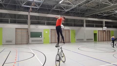 Guy Shows Mind-Blowing Balancing Skills While Riding Cycle During Training Session