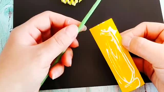 Origami - hand holding paper flower