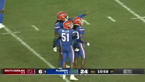 Florida 415 pound player rips the ball out of South Carolina player's hands