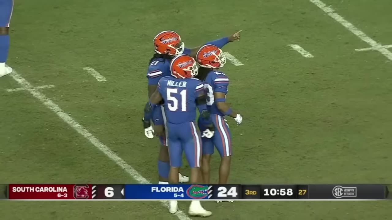 Florida 415 pound player rips the ball out of South Carolina player's hands