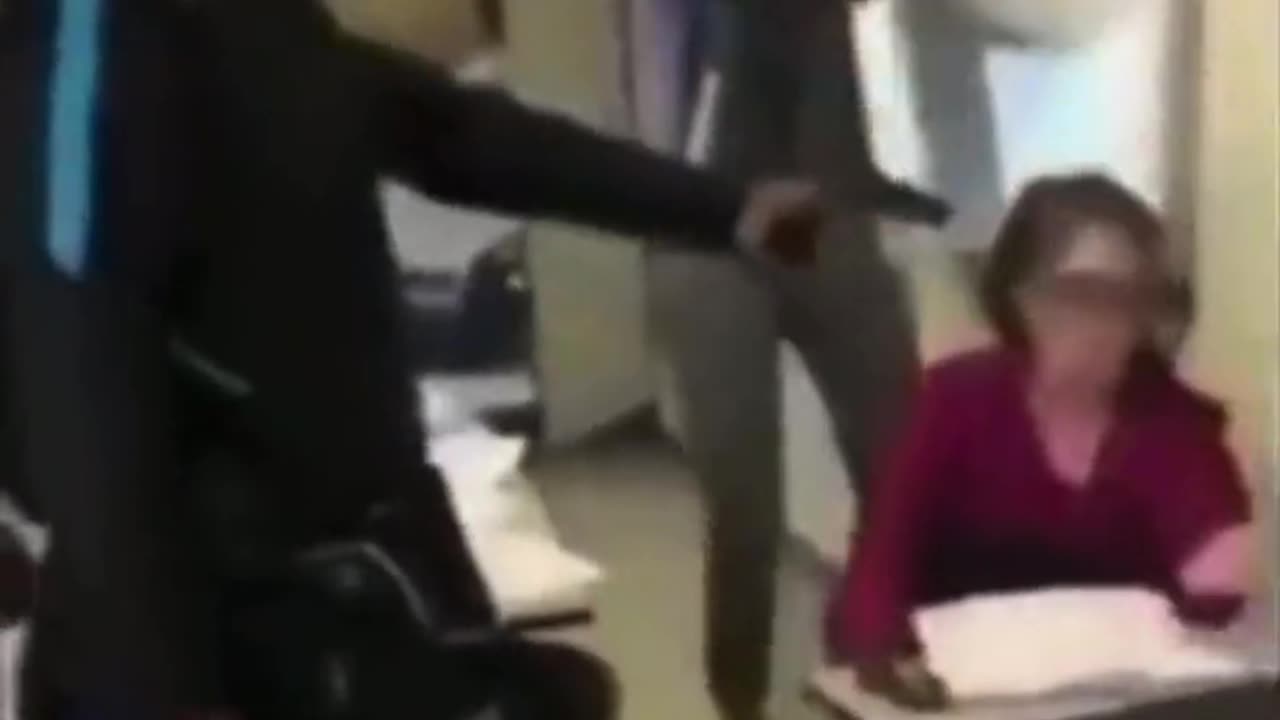 school kid pulls a gun out on a teacher