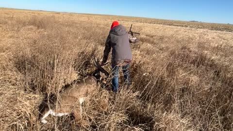 Wife walks up on her biggest buck yet.