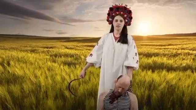 Bizarre ISIS-Style Propaganda Video Shows Ukrainian Woman Mock-Executing Russian Soldier