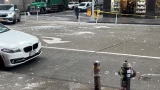 Big Ice Chunks Falling from Sky Nearly Hit Pedestrian