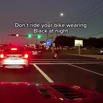 Biker crosses the street on a red light - gets smacked