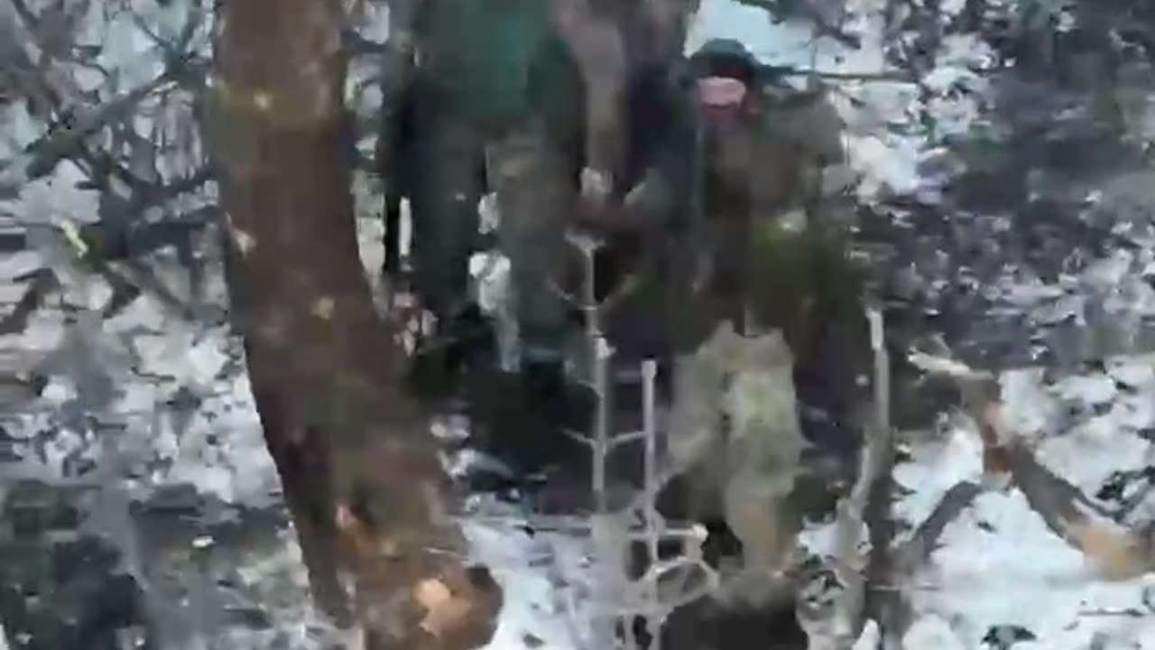 UAF drone filming Russian soldiers firing machine guns at it