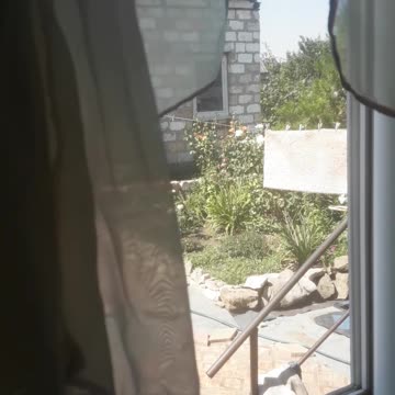 Kitchen window open to the courtyard