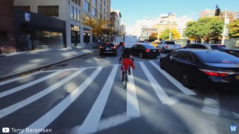 Bike Messenger Riding Fast and Fluid Through NYC Traffic