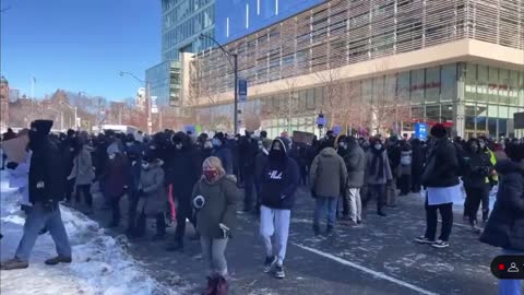 Counter protesters chant healthcare workers are under attack. Stand up fight back.