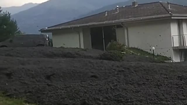 Massive mudslide hits small town in Switzerland...