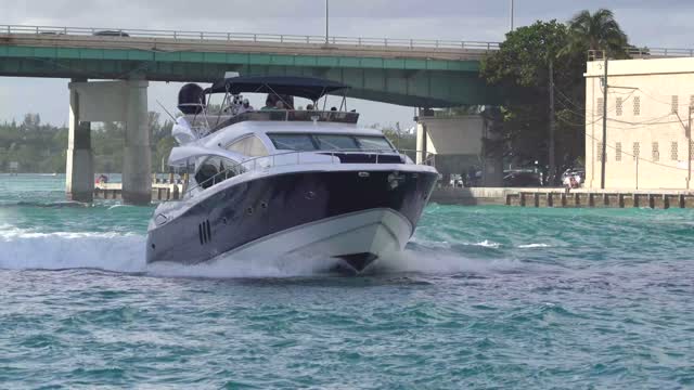 Jet Ski Rider Falls Close to Oncoming Boat