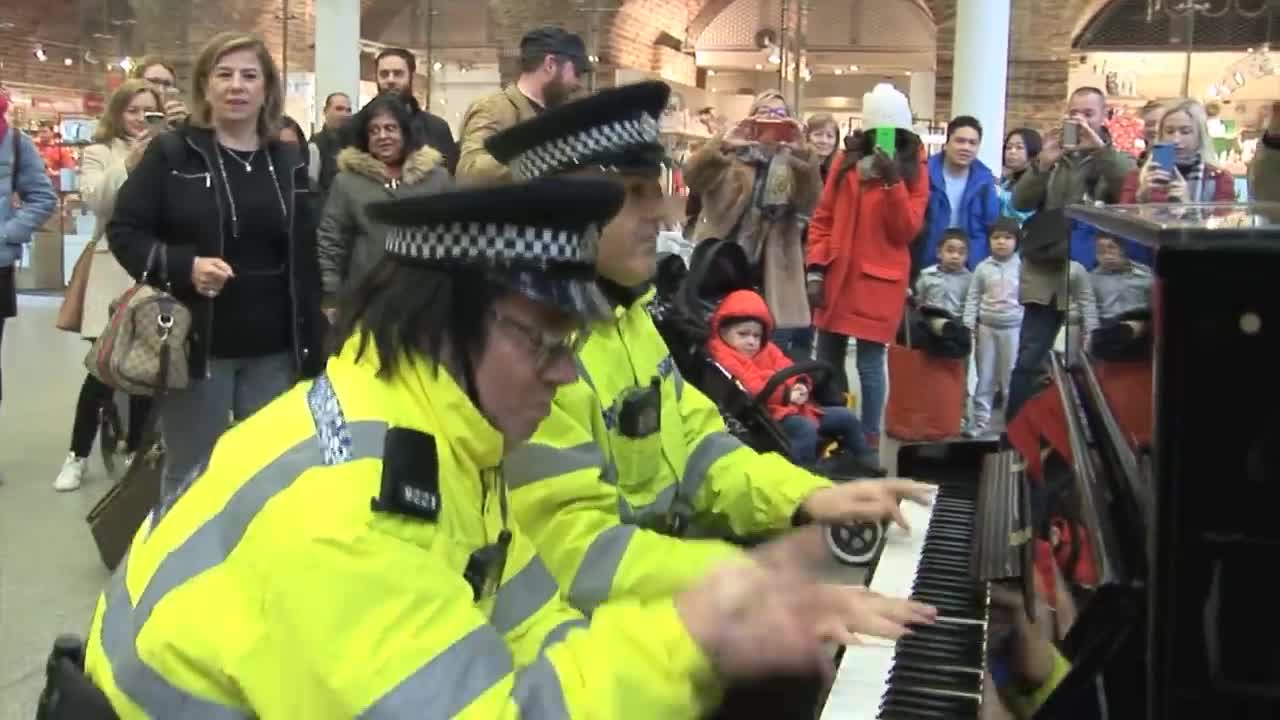 Two Police Rock and Roll The Station Piano