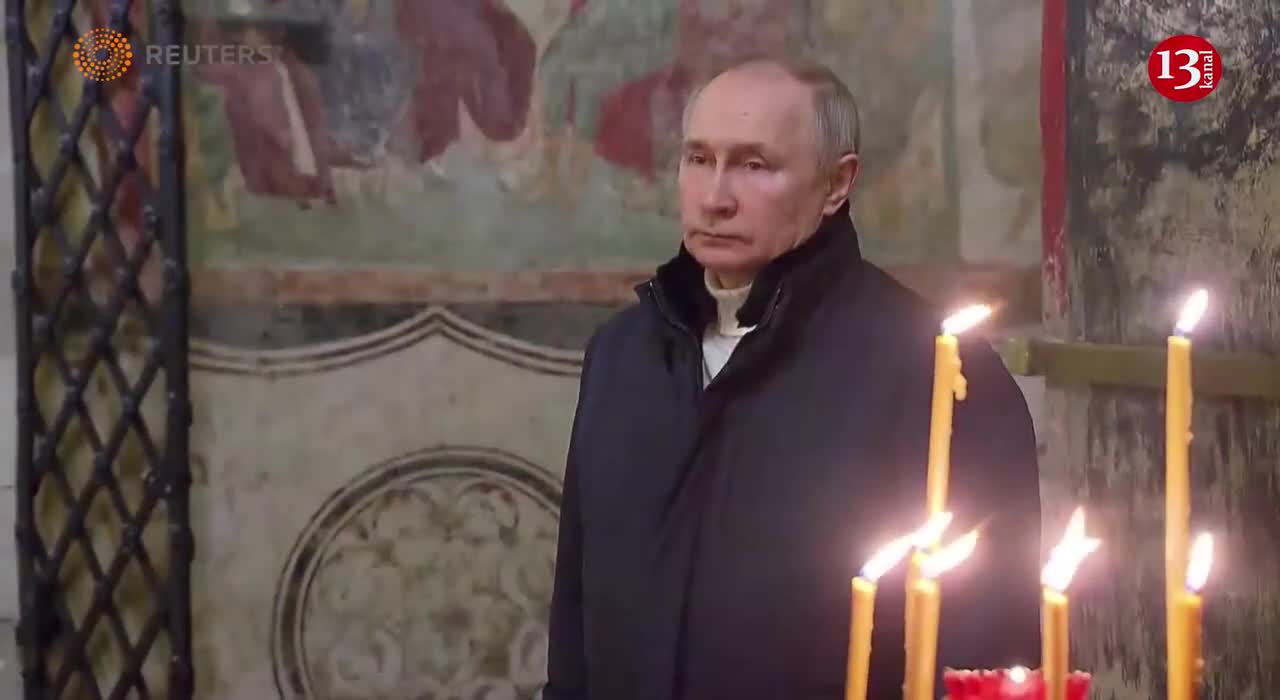 Putin attends Orthodox Christmas service by himself in Kremlin