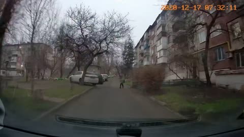 Kid Runs Out On The Street In Front Of A Car And The Driver Stops In Time - Close Call