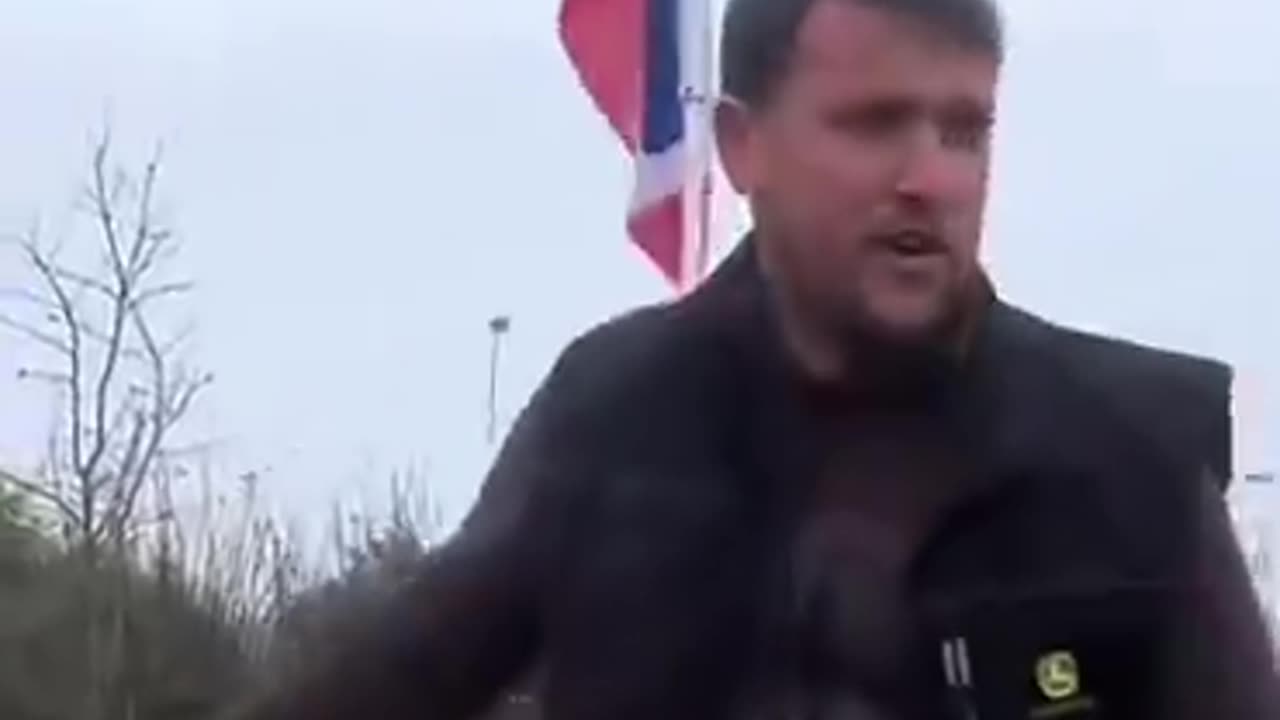 French farmers remove the European Union occupation flag