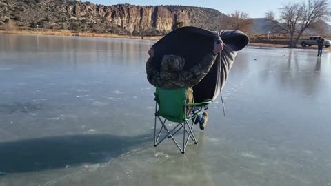 Man Rides in His Wind-Drawn Sleigh and Enjoys It