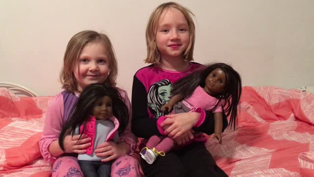 Two White Girls Happy to Get Black American Girl Dolls for Christmas