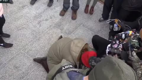 Kenosha: Female Protester collapses while protesting Rittenhouse verdict