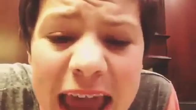 boy eats raw egg