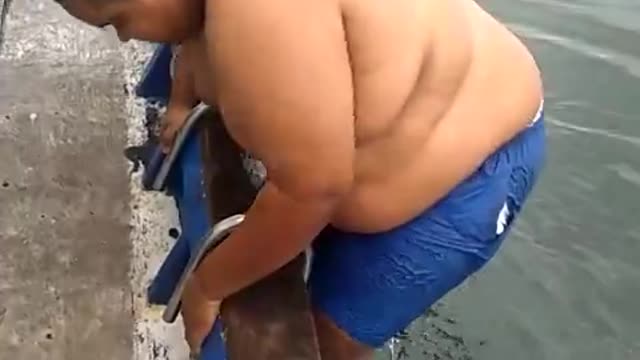 Big Brazilian Boy vs Boat