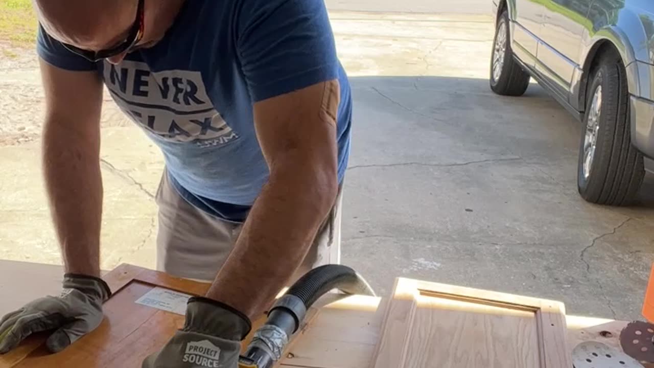 10x speed video of a cabinet door being sanded